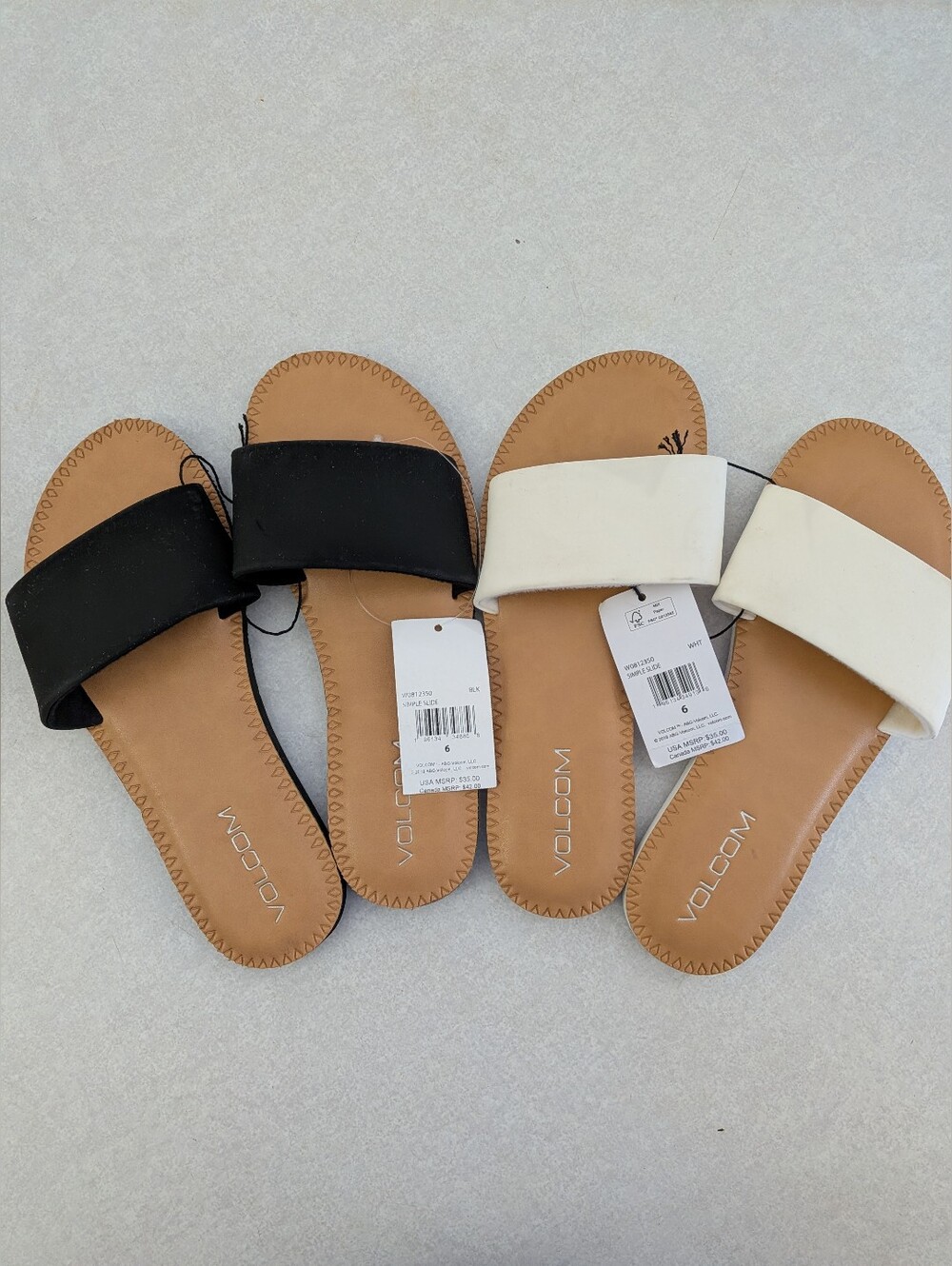 2 Pair Women's Volcom Slip On Sandals size 6 Black And White. NEW